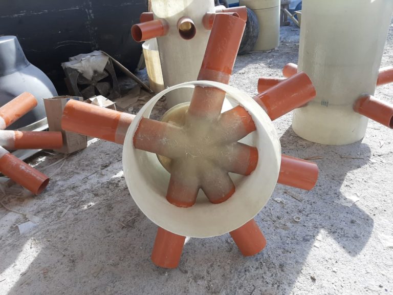 GRP manhole bases with laminated pipe inlets