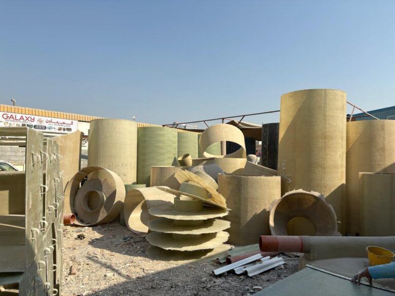 Factory yard, tanks and pipes